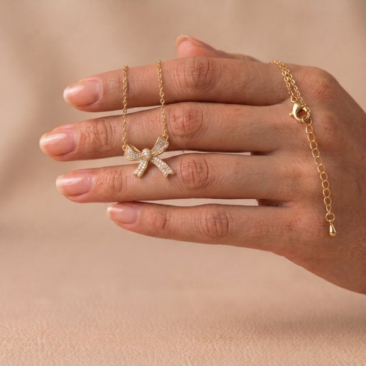 Gold Crystal Bow Pendant
