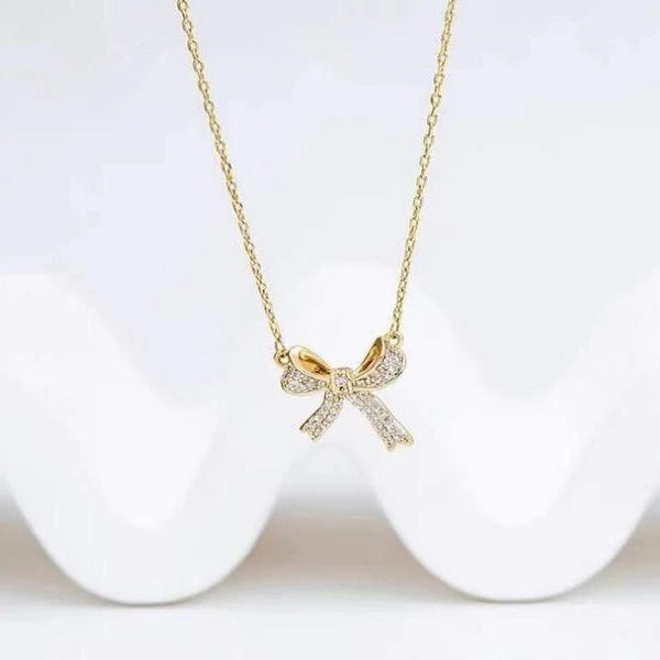 Gold Crystal Bow Pendant